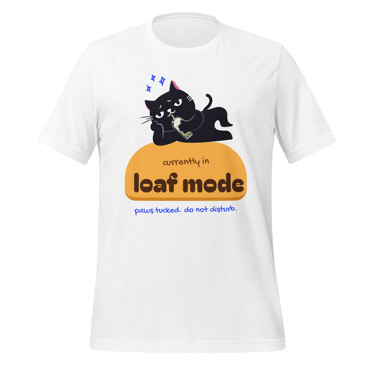 White unisex t-shirt with a black cat sipping boba on an orange loaf and the words “currently in loaf mode”